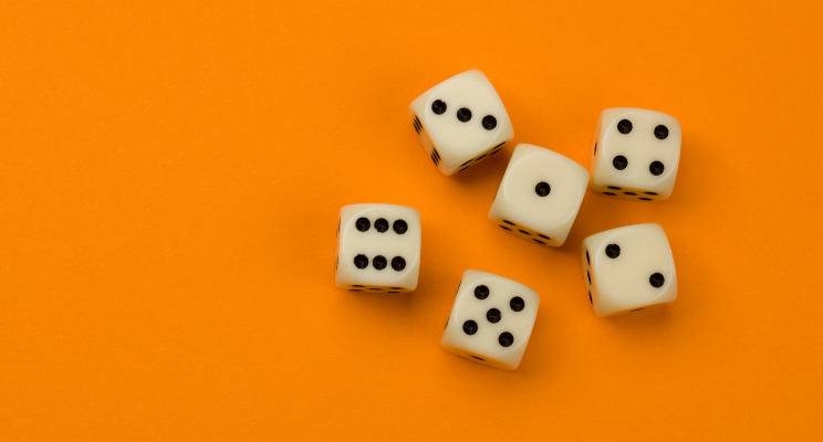 six dice against an orange background
